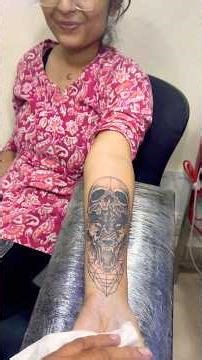 “We covered up an old wolf tattoo and created a new design featuring a wolf and a skull.