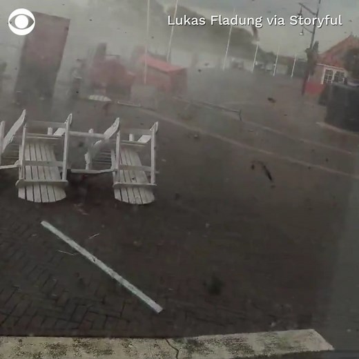 72K views · 1.2K reactions | A tornado killed at least one person and injured at least nine in the Netherlands on Monday. Video taken in Zierikzee, Netherlands shows debris flying through the sky and outdoor furniture carried away by strong winds. | CBS News | Facebook