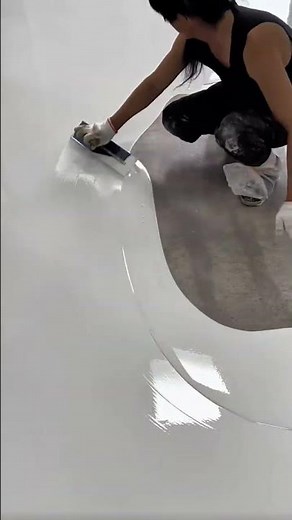 Applying a Self-Leveling Epoxy Floor Coating for a Seamless High-Gloss Finish
