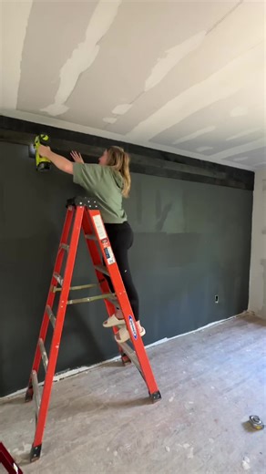 Dreaming of a new look for your walls? Watch Sarah @FromDirt2Details transform her space with our Anthracite Wall Boards! No DIY experience needed! With just three simple steps (paint, measure & cut, install), you can create a stunning feature wall that’s uniquely yours. Ready to get started? Catch the full how-to video on our website and make your vision a reality! Weathered Wall Boards in Anthracite available online at @The Home Depot. #woodwall #howto #makeitweaber #DIYhome #weaberlumber