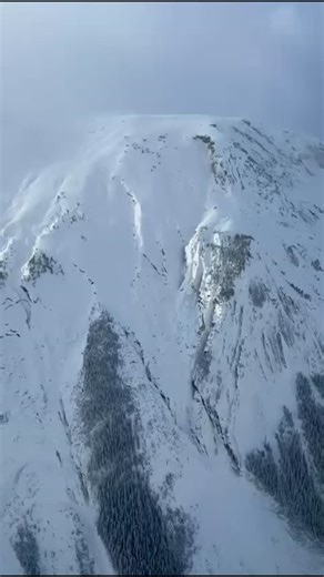 Bob MacDonald on Instagram: "One heckin' large avalanche! Mt Saskatchewan, Icefields Parkway. (near Weeping Wall) 🎥 Credit: Cory Boschman - Dec 19, 2025"