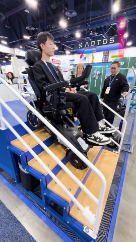 This wheelchair climbs stairs!