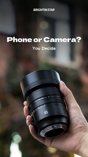 Brightin Star on Instagram: "📱 Phone or Camera? You decide! Same scene. Same light. But a totally different vibe — phone shows reality, camera shows emotion Which side wins for you? Drop 📱 for phone or 📷 for camera! #brightinstarlens #fullframe #photographydaily #85mm #brightinstar85mm #autofocus #brightinstar #cameralens #streetphotography #aperture #comparison"