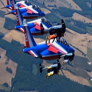 27K views · 125 reactions | Flying over a formation of jets with your own wings must be the most amazing feeling in the world!!!. | FlashPoint News | Facebook