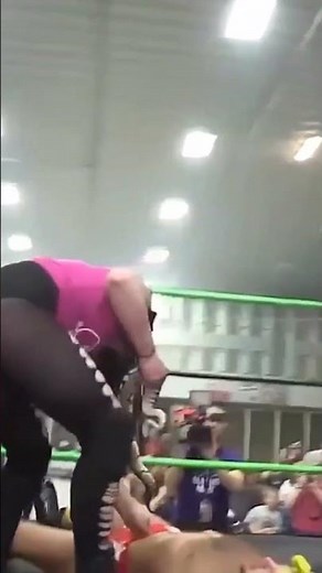 Woman Puts Python Down Wrestlers Trunks