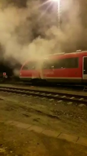 Modern Train Design at Night with Smoke Emission