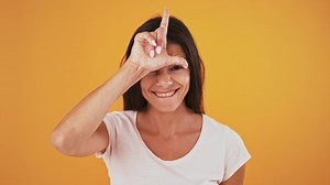 Female Laughing Showing Loser Gesture Tongue Stock Footage Video (100% Royalty-free) 1058114644 | Shutterstock