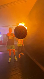 Photographer assistant hits his phone with a basketball of fire. | SBJ Studios