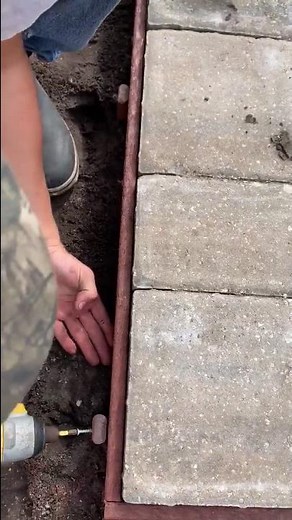 Setting your Artificial Turf Edge with Bender Board Against Pavers