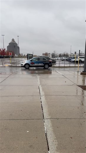 A Ford Edge Paragon Security Vehicle passing by Centennial College Progress Campus Terminal