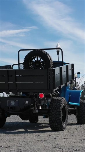 Another happy customer is rolling down country roads in their NEW Desert Power Wagon Dump Bed! This beauty is powered by a 6.7L Cummins®️ Turbo-Diesel married to an automatic transmission! • Stepping into the Aloha Blue Metallic cab with Maui Blue Metallic accented fenders, we have a premium sound system controlled by the latest from @kenwoodusa_official with @vintageair_ climate control. The fully custom hand-stitched upholstery has been completed by our team in-house, pushing the boundaries in
