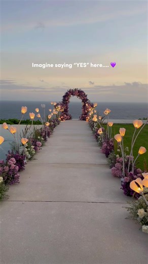 Walking Through a Purple Flower Aisle at Sunset in Bali