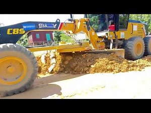 Rolling and Compacting Embankment Layer for Road Construction
