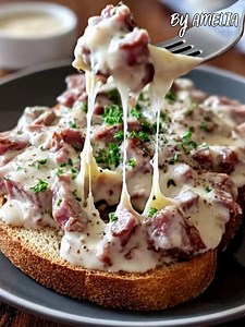 Classic Creamed Chipped Beef on Toast This old-fashioned comfort dish is creamy, savory, and hearty—perfect served over toast or biscuits for breakfast, brunch, or a quick dinner. Ingredients: 4 tbsp unsalted butter ¼ cup all-purpose flour 2 cups whole milk ½ tsp black pepper ½ tsp garlic powder ½ tsp onion powder ¼ tsp paprika ¼ tsp cayenne pepper (optional) ½ lb dried beef, thinly sliced and chopped Toast or biscuits, for serving Instructions: In a skillet over medium heat, melt butter. Whisk 