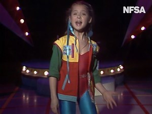 What better way to tackle Wednesday than with some FAME energy - thanks to Asher Keddie on Young Talent Time in 1983! 💥 Relive more of these amazing moments: nfsa.gov.au/youngtalenttime 🌟 #YoungTalentTime #NFSAOnline | NFSA - National Film and Sound Archive of Australia