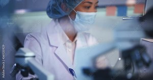 Female doctor working in laboratory. Studying medical samples
