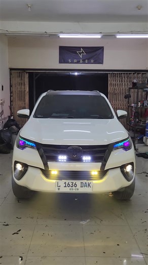 FORTUNER VRZ NGE GRIP ⚡️⚡️⚡️ SPEC : 1. SABER SR 900 EVO PURE LASER [HEADLAMP] 2. DRL MATRIX RGB 3. DEMON MATRIX RGB 4. FULL BLACK HOUSING #fyp #fypシ゚viral #fypdongggggggg #fortunergr #cumidarat #teamnocopascopas #teampetir #saberindustries #lightstoresurabaya #cinematicmobil #ledlight #led