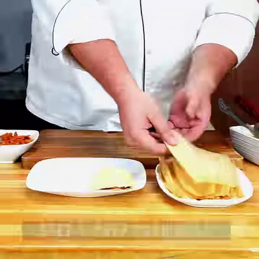 How to wrap a tamale in 4 easy steps! . 1. prep corn husk 2. place masa on center of husk and spread evenly 3. add filling 4. fold corn husk left, then right and bottom up! #vallartasupermarkets #holidayseasonistamaleseason | Vallarta Supermarkets