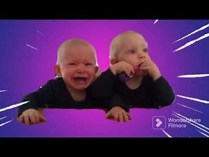 baby twins fighting over pink toothbrush