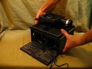 VINTAGE BELL AND HOWELL SLIDE CUBE PROJECTOR Model 977Q
