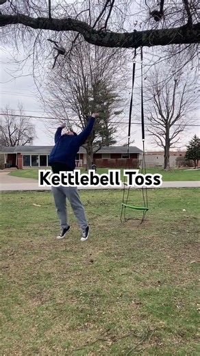 Kettlebell toss over tree