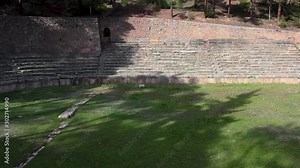 Wide, panoramic view of the Stadium of Delphi Sanctuary at the highest spot of the archaeological site in Phocis, Greece.