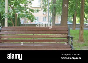 Casual Woman Coming to Sit on Park Bench Stock Video Footage - Alamy