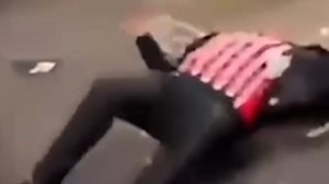 Football hooligan headbutts rival fan who collapses to the ground