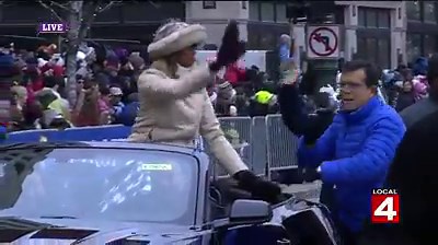 Co-Grand Marshall Carmen Harlan is being driven down Woodward Avenue by Detroit Mayor Mike Duggan at America's Thanksgiving Parade. | WDIV Local 4 / ClickOnDetroit