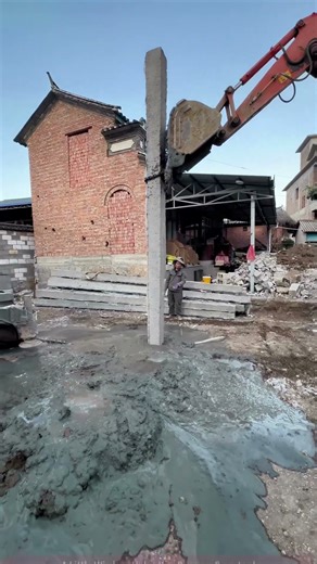 Rural self-built house pile foundation construction - Excavato mud wall protection, full core pile