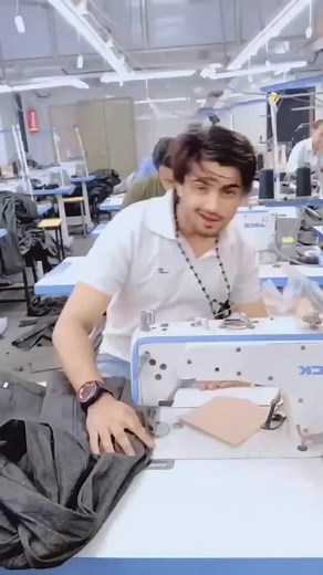 Sewing Machine Operations in Factory Setting