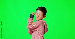 Strong, face and child in a studio with green screen flexing his arm muscles after exercise. Strength, comic and portrait of a boy kid model showing his biceps isolated by a chroma key background.