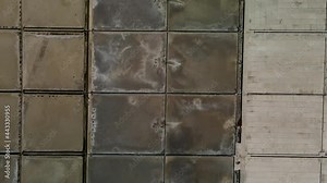 Birdview drone flight next to a salt field in Croatia at daytime