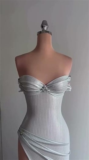 To order this silver dress DM reineecouture A sculpted strapless corset bodice defines the