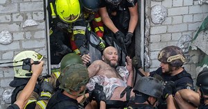 Photos show aftermath of a deadly Russian attack in Ukraine and the funeral of a fallen soldier
