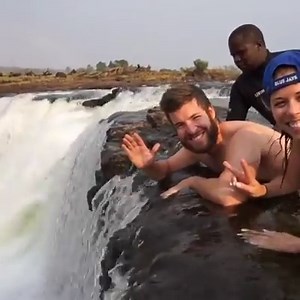 Hanging off the edge of Devil's Pool in Zimbabwe looks insane 😱🌍 | UNILAD Adventure