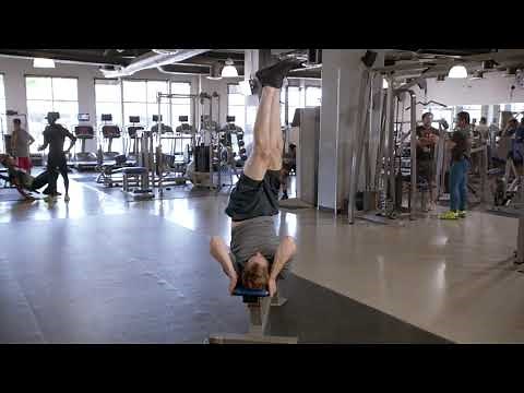 How to do a Reverse Crunch to Knee-Up with Rotation | Proper Form & Technique | NASM