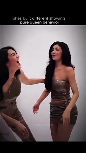 Kylie Jenner lifting model Amelia gray during a photo shoot for her brand..