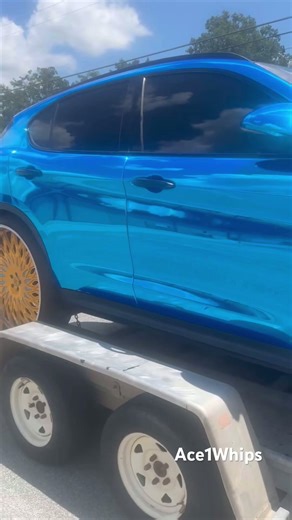 Chrome blue Alfa Romeo Stelvio on gold 30’s