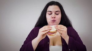Close-up Of Young Woman Enjoying Sandwich Stock Footage SBV-338113103 - Storyblocks