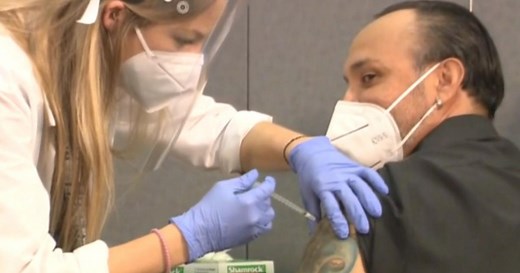 Extra doses in Pfizer vaccine vials expand nation's supply