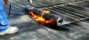 How to Lay Asphalt Roll Roofing | DoItYourself.com