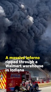 This 1.2 million-square-foot Walmart warehouse in Indiana caught fire on Wednesday, sending a gigantic tower of smoke visible from miles away. All 1,000 employees of the facility remained unharmed. One firefighter was treated for minor injuries. The ATF is investigating the cause of the fire, but officials say there is no initial indication of foul play. | NowThis