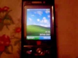 Sony Ericsson K800i with Windows XP startup/shutdown, splash and menu