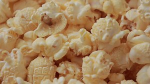 Download Closeup of popcorn snack background, popcorn corn food for free