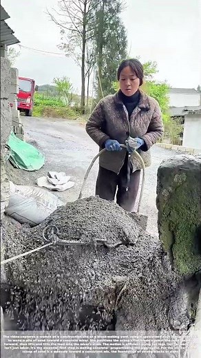 Feeding the Mixer: How a Scoop Shovel Delivers Sand for Concrete