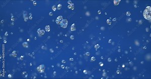 Slow motion macro of floating micro particles molecules in liquid are analyzed with microscope by chemist during innovative new medical research and analysis in scientific pharmaceutical laboratory.
