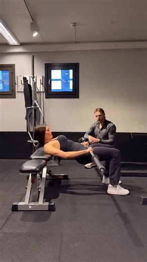 Lukas Dudenas - ONLINE COACH - Glute training on Instagram: "If your hip thrusts hurt your lower back, this is why. Most women aren’t weak in hip thrusts — they’re just being taught the wrong position. EDUCATION ✅ Hip thrusts are a hip hinge, not a lower-back extension. When you arch hard and “throw” your ribs up, the load shifts into your lumbar spine. When you tuck the pelvis, bring the chin down, and scoop the hips, the glutes take over like they’re supposed to. REAL-LIFE APPLICATION ✅ Cue it