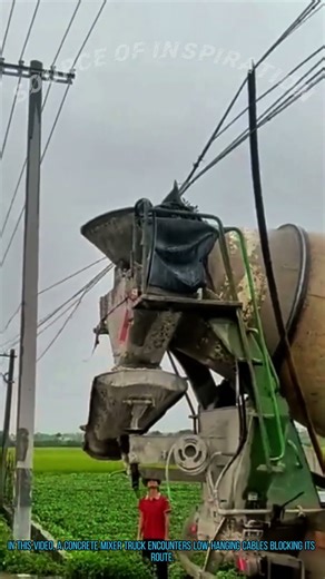 Concrete Truck Passes Under Low Hanging Cables (With Long Pole)