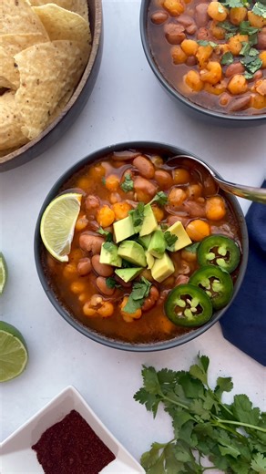 This vegan pozole recipe uses pinto beans instead of pork for a flavorful, meatless soup! This recipe is packed with spicy flavor, plus plenty of plant-based protein from the beans! Ingredients: 1 tablespoon olive oil 1 onion, chopped 3 cloves minced garlic 2 teaspoons chili powder 1 teaspoon cumin 1 teaspoon oregano 2 15 oz cans pinto beans, drained 2 15 oz cans hominy, drained 10 oz enchilada sauce 4 cups vegetable broth Instructions: Stovetop Directions: Add the olive oil and onion to a large